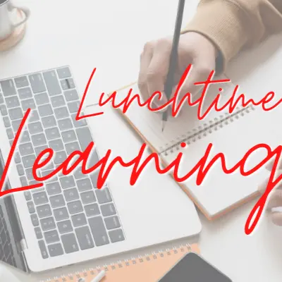 image of laptop and notebook with "Lunchtime Learning" text overlaid