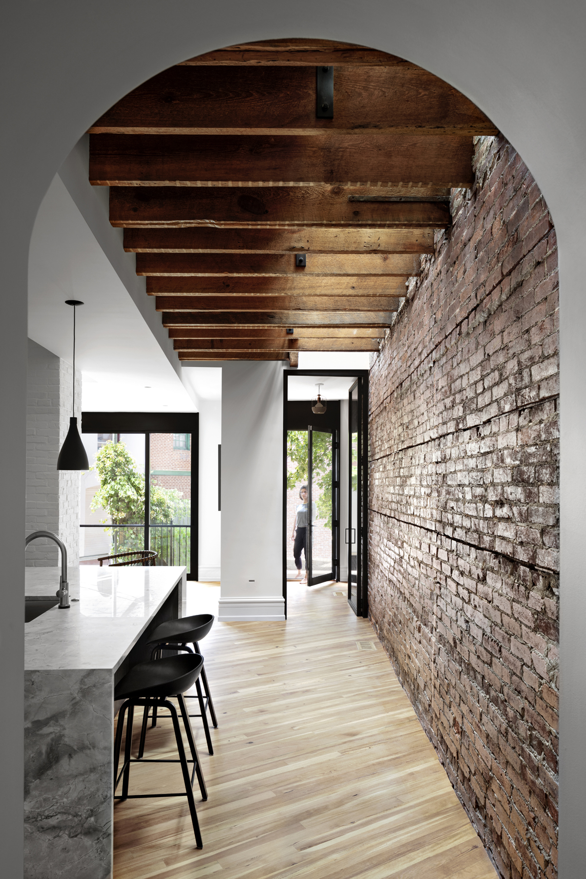 modern renovation of a historic townhouse where we exposed elements and added skylights above